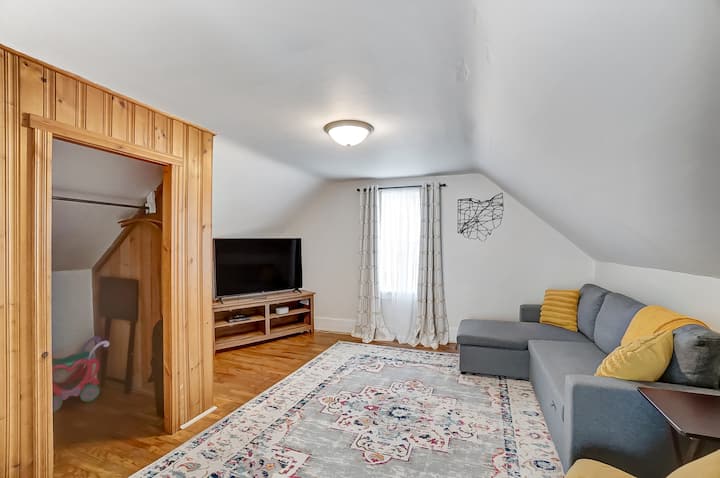 Upstairs Bedroom 3/Media room. Features 55" smart TV, blu ray/dvd player and movies, children toys, and pack n play.  Pull out couch and fold out chair with privacy curtain. Sleeps 2.