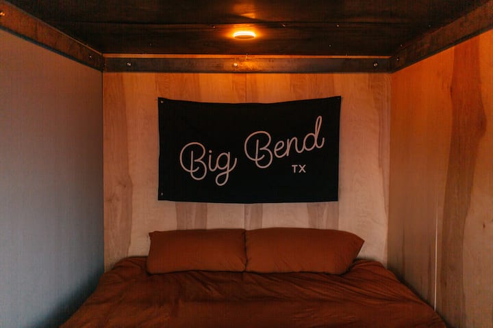 View into bedroom two with custom artwork and "ring" lighting amber color option. Beds are king size on cool gel mattresses with down comforters and super soft jersey cotton sheets.