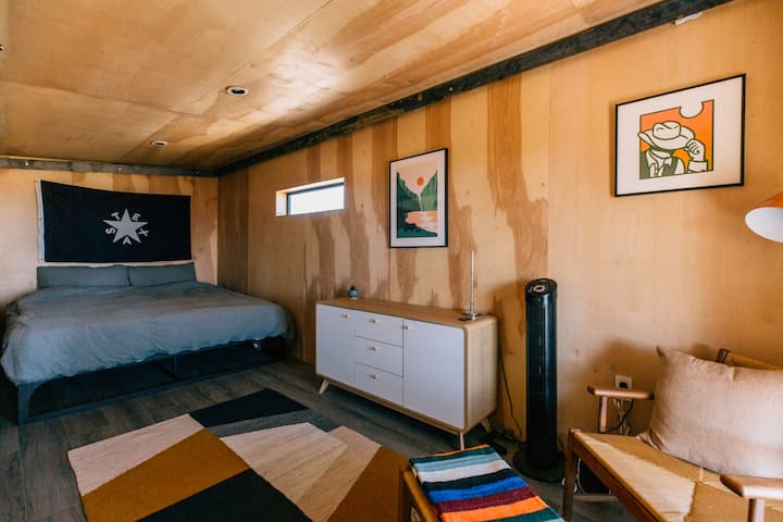 Upper stair-accessed loft bedroom.