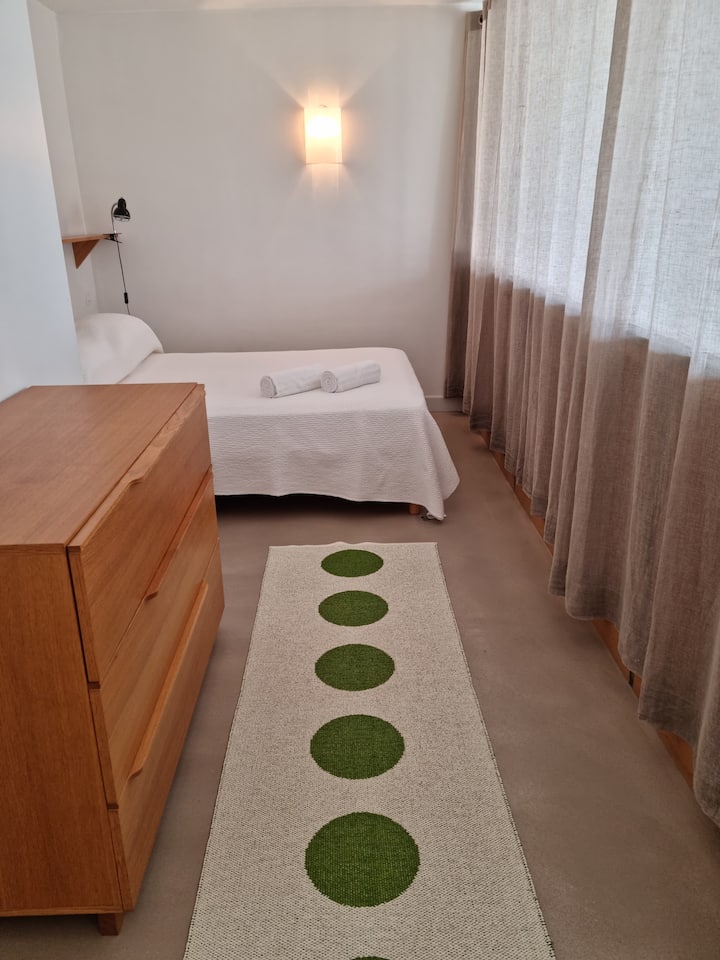 Dormitorio mezzanine con vistas panorámicas al golfo de Porto-Vecchio