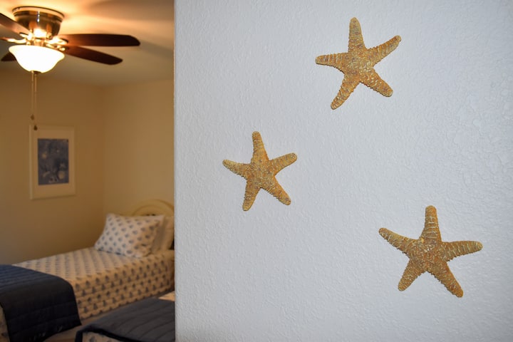 The entrance to the first bedroom featuring some starfish.
