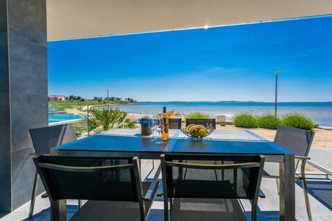 Family room with heated seaside pool