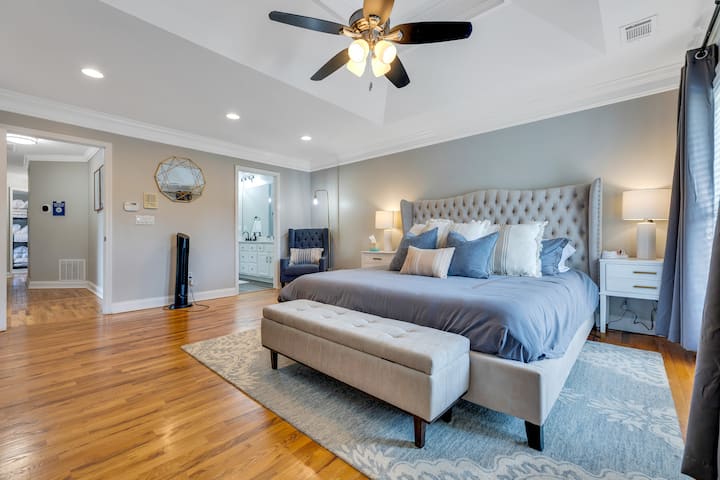 Sound asleep, be energized, and relieve your stress in this sophisticated, spacious, and comfortable king-sized bed. "The rooms are spacious, the beds are super comfy and the place was very clean, Ms. Christal" (Bedroom 1)