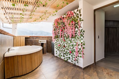 Apartment with a jacuzzi on the terrace and a beautiful view