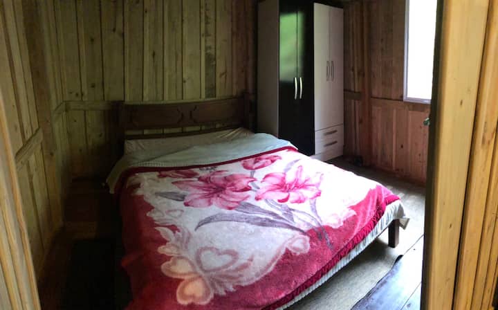 Bedroom 2 containing a double bed with foam mattress