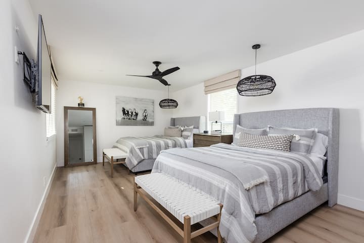 Master Bedroom #2.  Dual Queen mattresses, large flat-screen TV.