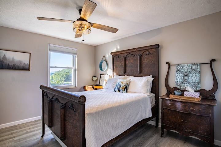 Relax in the second bedroom in an impressive 125-year old bedroom suite.