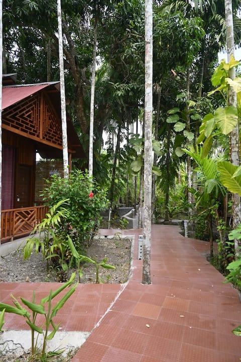 Placid garden resort with Cottages Room