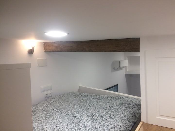 Le lit en mezzanine.