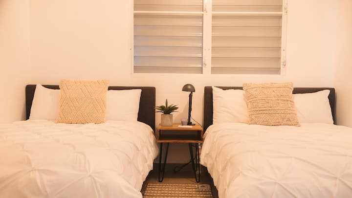Two single beds with closet space!