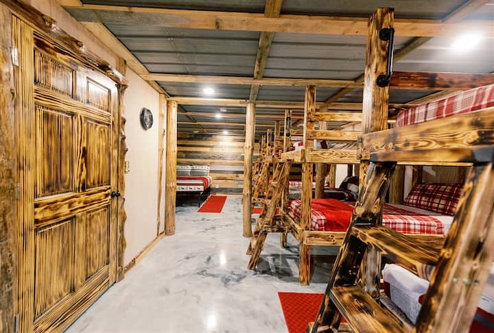The bunk room has 4 bunk beds and 1 queen bed. Room for everyone!