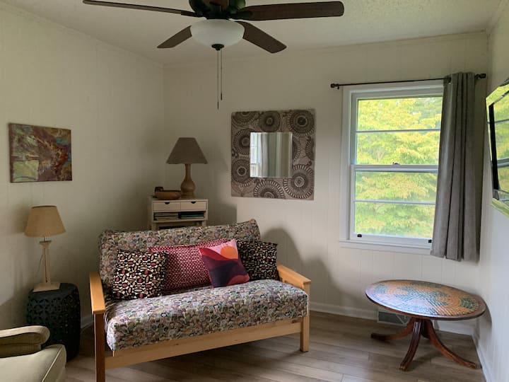 The 5th bedroom has a futon sofa, a streaming device TV (along with VHS/DVD player; selection of movies can be found in the living room closet), kids' books, toys, puzzles and games.