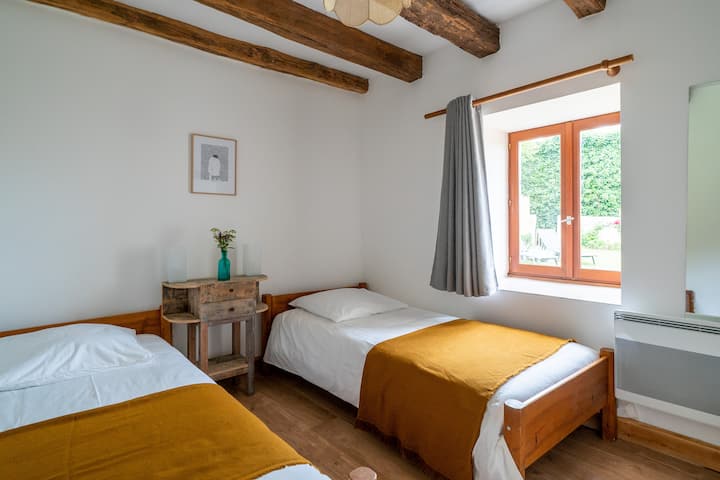 Slaapkamer eenpersoonsbedden Chez Misja