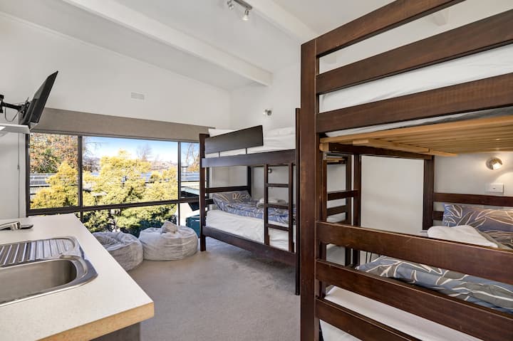 Two sets of bunks.  This room has a TV, 2 beanbags and some games.  The room connects to the main living room.

Photo taken May 2021