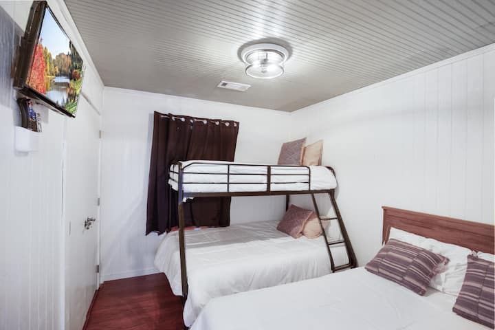 Cabin D: Guest bedroom with 1 Full bed + 1 Bunk bed (Full on bottom / Single on top)