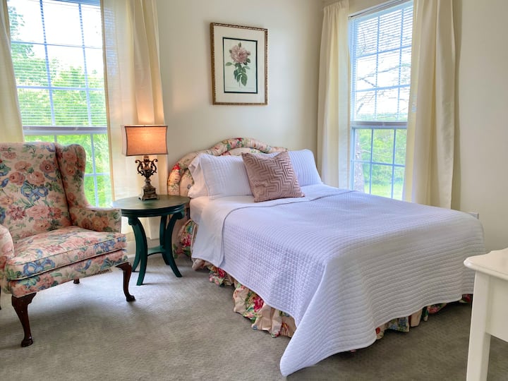 Rose North room with full size bed.