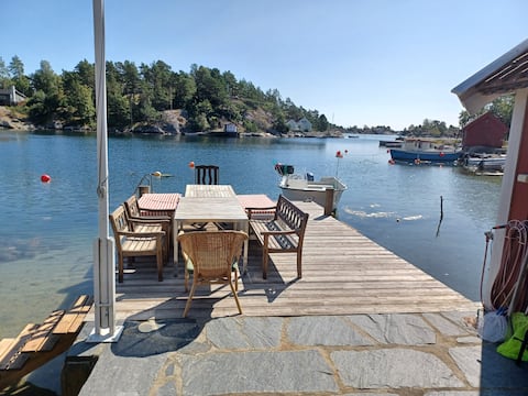 Large house with boathouse, beach and jetty