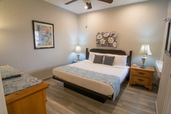 Beautifully updated flooring in our tranquil guest bedroom, platform bed with new comfy King mattress.