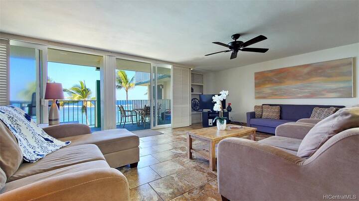 Large great room with amazing ocean views that include dinning, living and kitchen areas.

