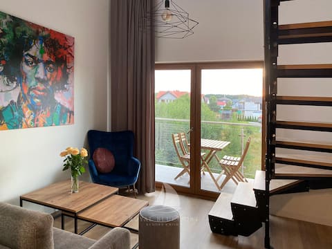 Successful Airbnb property: A two-level 4-bed apartment with a balcony in Gmina Ustka