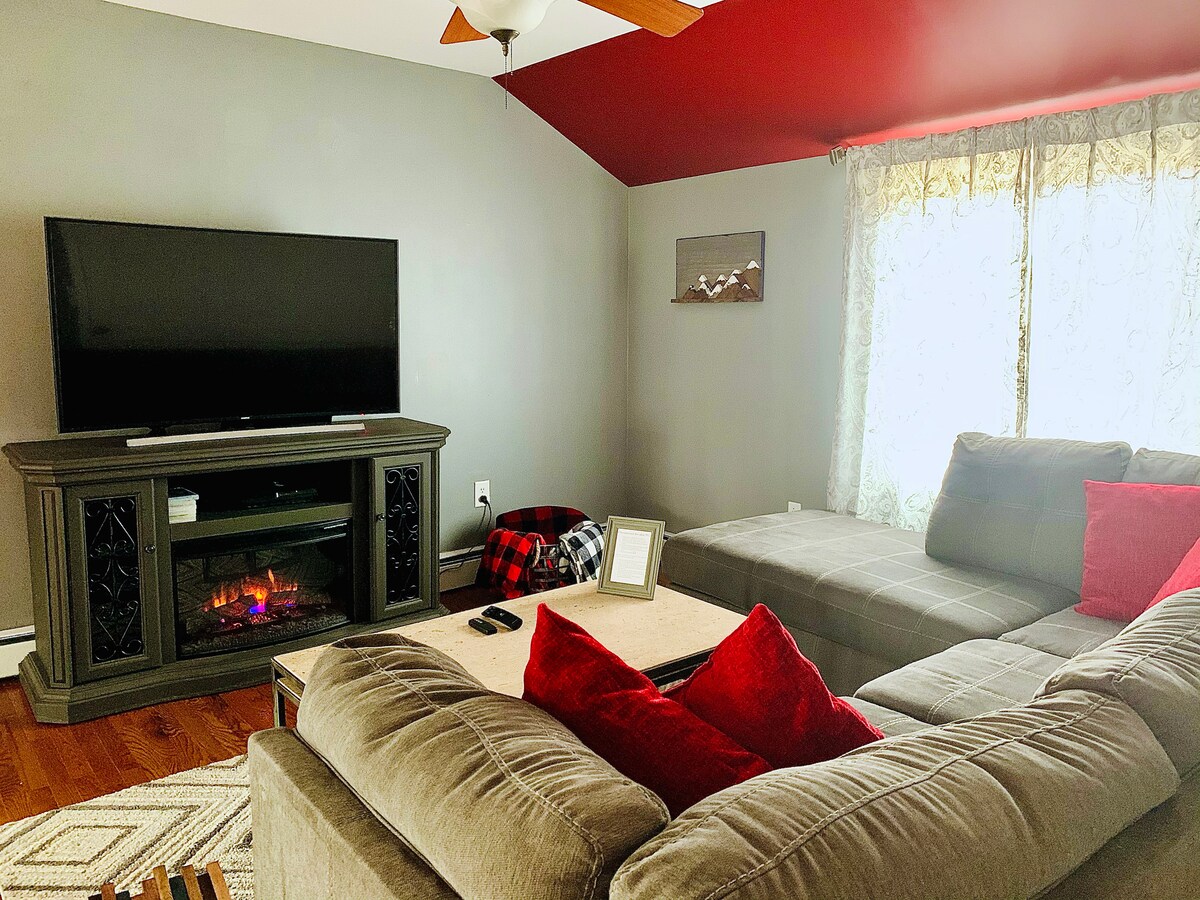 Reúnete alrededor de la gran televisión con Chromecast y chimenea eléctrica