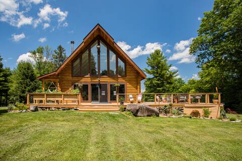 Luxe retreat w/ sauna, hot tub, and swimming hole!