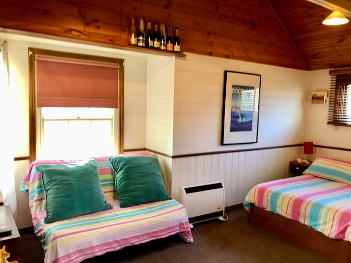 The front bedroom has a double bed and double sofabed. 