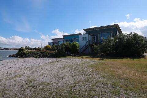 spacious luxury beach house with hot tub and lots of luxury