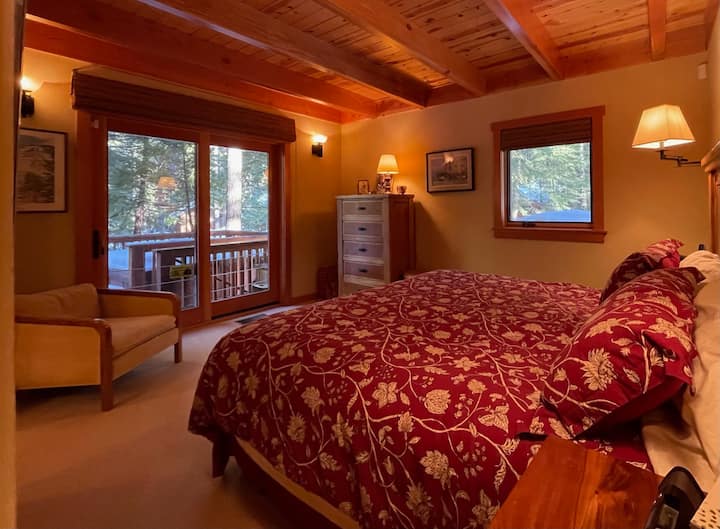 Master bedroom, access to back deck with hot tub.