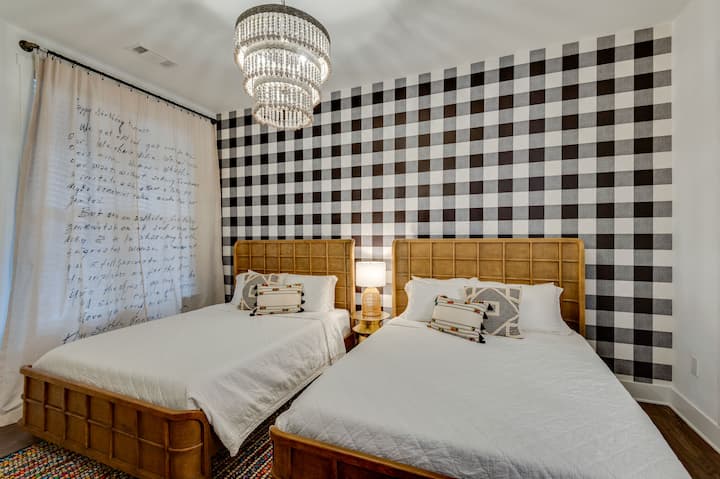 2nd bedroom with two queen beds with attached bathroom (soaking tub/shower combo)