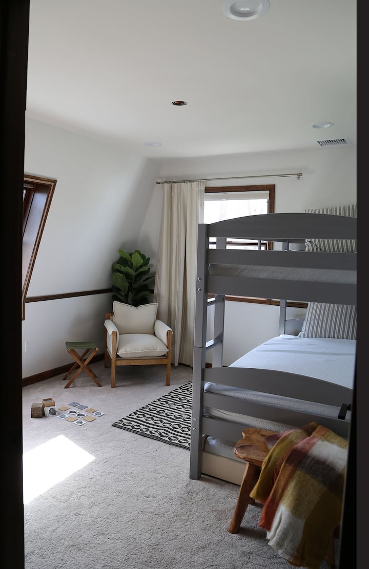 Bunk room.  Space to play games  and mountain views.