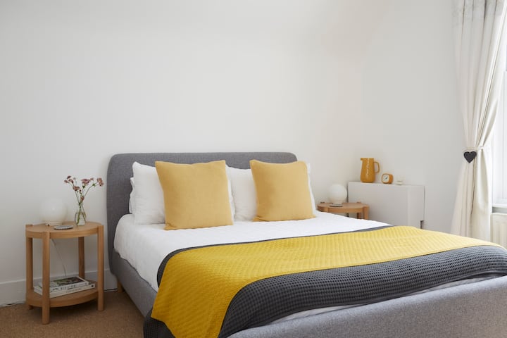 King Bedroom with views onto the front garden.