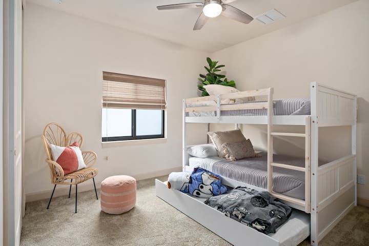 Make up the bunks with your favorite Disney characters. We love Frozen and Marvel!