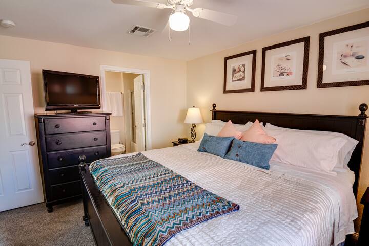 Master bedroom with en suite bathroom is spacious and comfortable.