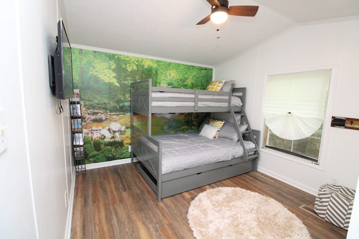 Bedroom 3 - Bunk Room with "Spring & Summer in Deep Creek" wall mural.