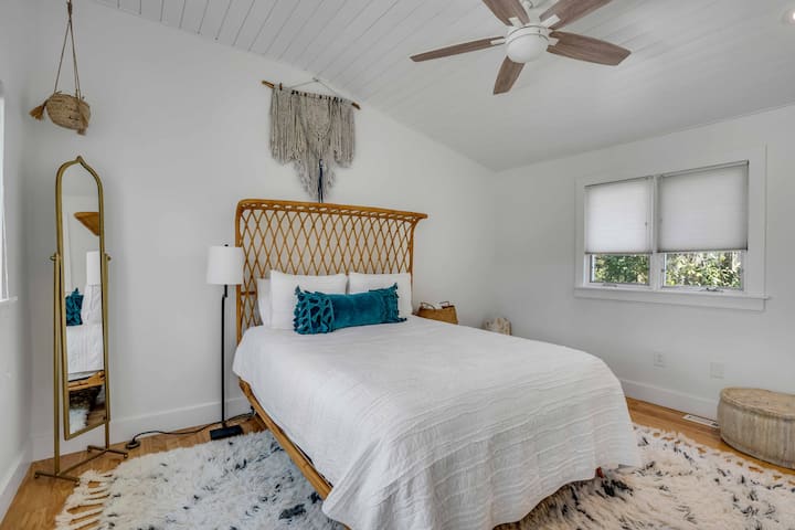 Indulge in relaxation in the plush primary bedroom, featuring a luxurious mattress and premium linens for a restful night's sleep.