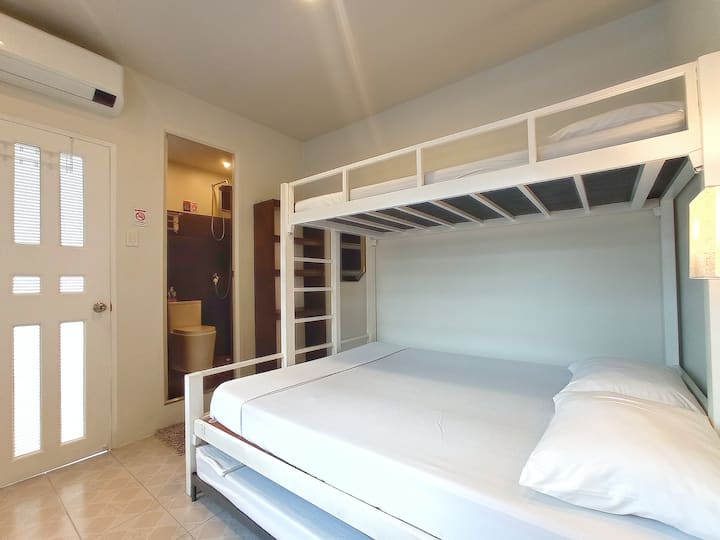 Bedroom 1 
- 1 Bathroom
- 1 Queen Bed
- 2 Single Bed (1 Pullout and 1 bunk)