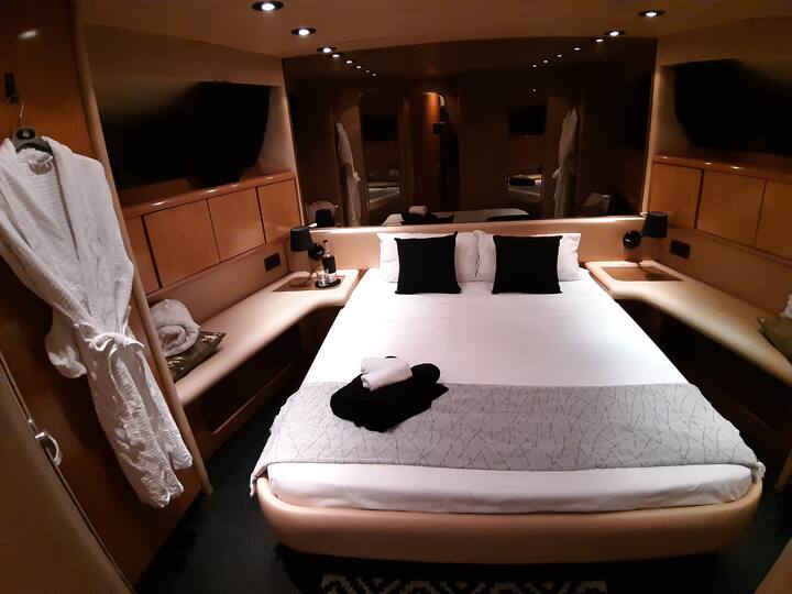 Your private cabin: the State Room with Queen bed, and private shower room and ensuite with toilet and sink.