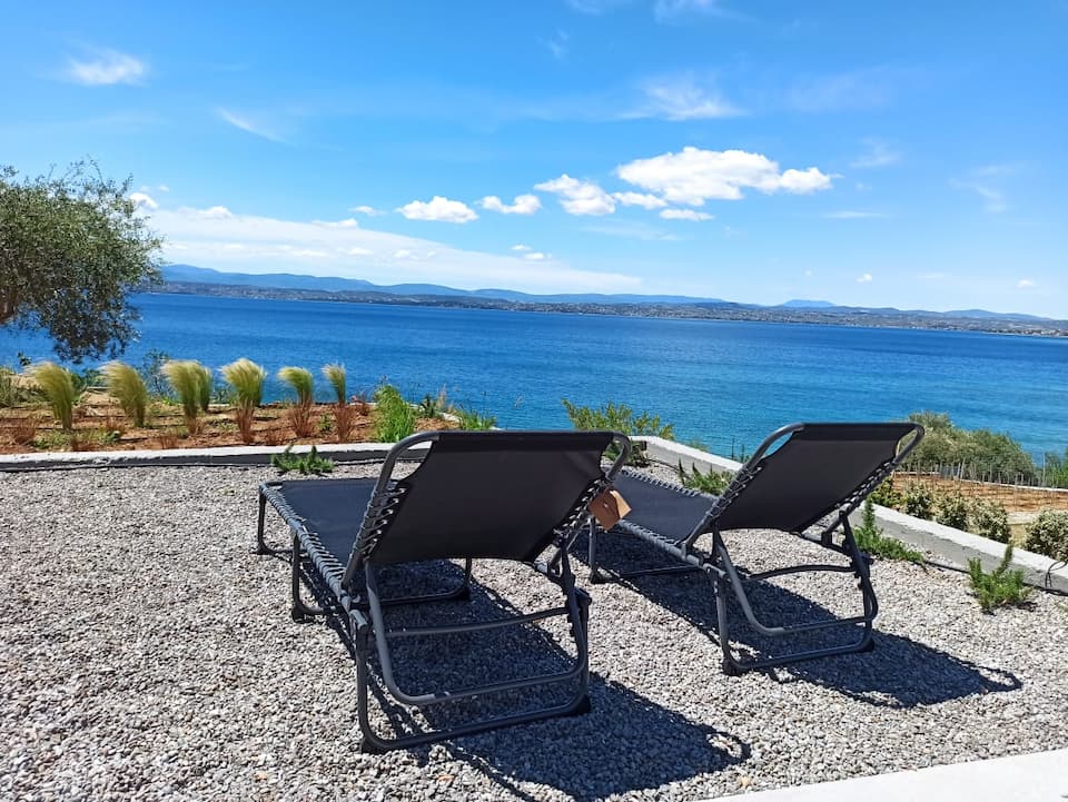 A seafront villa with a pebble cove, an hour from Athens, Vasiliko, Greece, photo 1 of 10