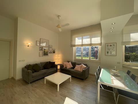 Bright green two-room apartment near San Raffaele