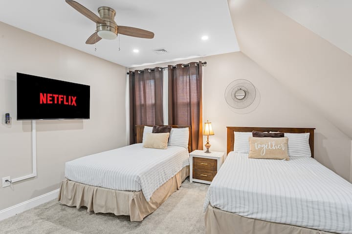 Bedroom 3 features two cozy double  beds, perfect for sleepovers.