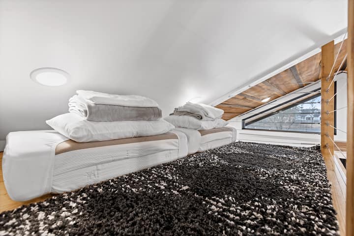 Loft space is perfect for kids! Twin mattresses are tri-fold to allow for space to play. Fold down the mattress when it's time for bed.