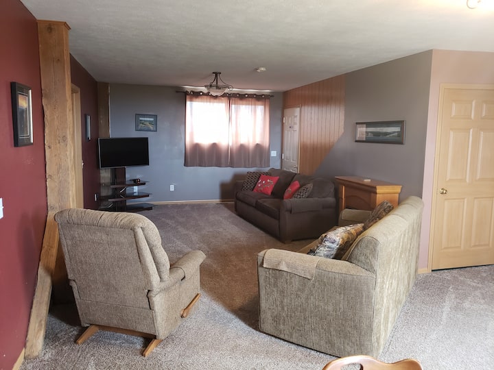 The living room includes two pullout couches, the closet stores 2 twin roll away beds.