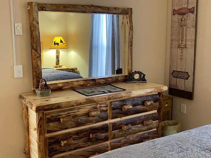 Master bedroom with rustic dresser