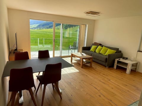 Amici Due right on the cross-country ski trail with an electric charging station