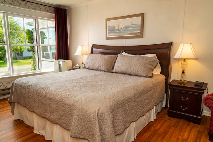 Room 1 has a view over the bay, with lovely natural light and a king sized bed. 