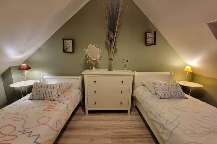 Bedroom 4: "The Forest" / With 2 single beds and also overlooking the courtyard