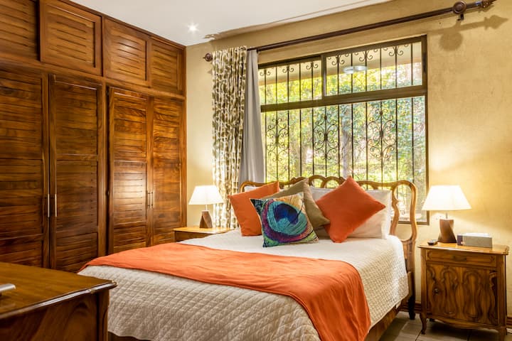 Second bedroom has a queen bed, AC and TV. It also has its own private bathroom. 