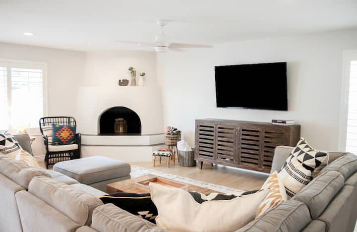 Welcome to the family room where you will find a huge L shaped sofa with perfect viewing of the 65” HDTV connected to an Xbox for some evening entertainment over a selection of games. Whilst the fireplace and 2 chairs add a stylish touch. 
