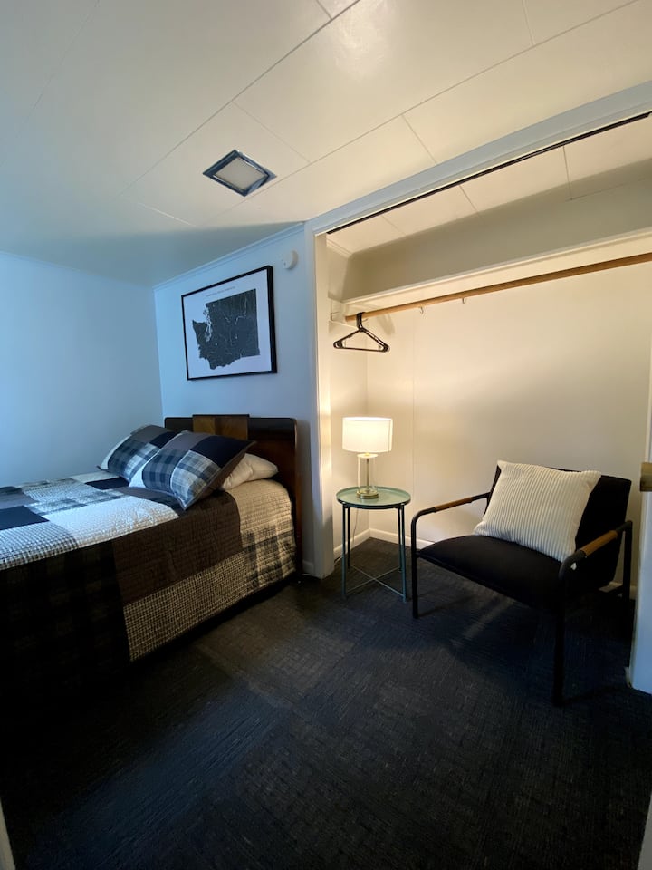 Bedroom #2,  double bed with new flooring and linens. Daylight windows.